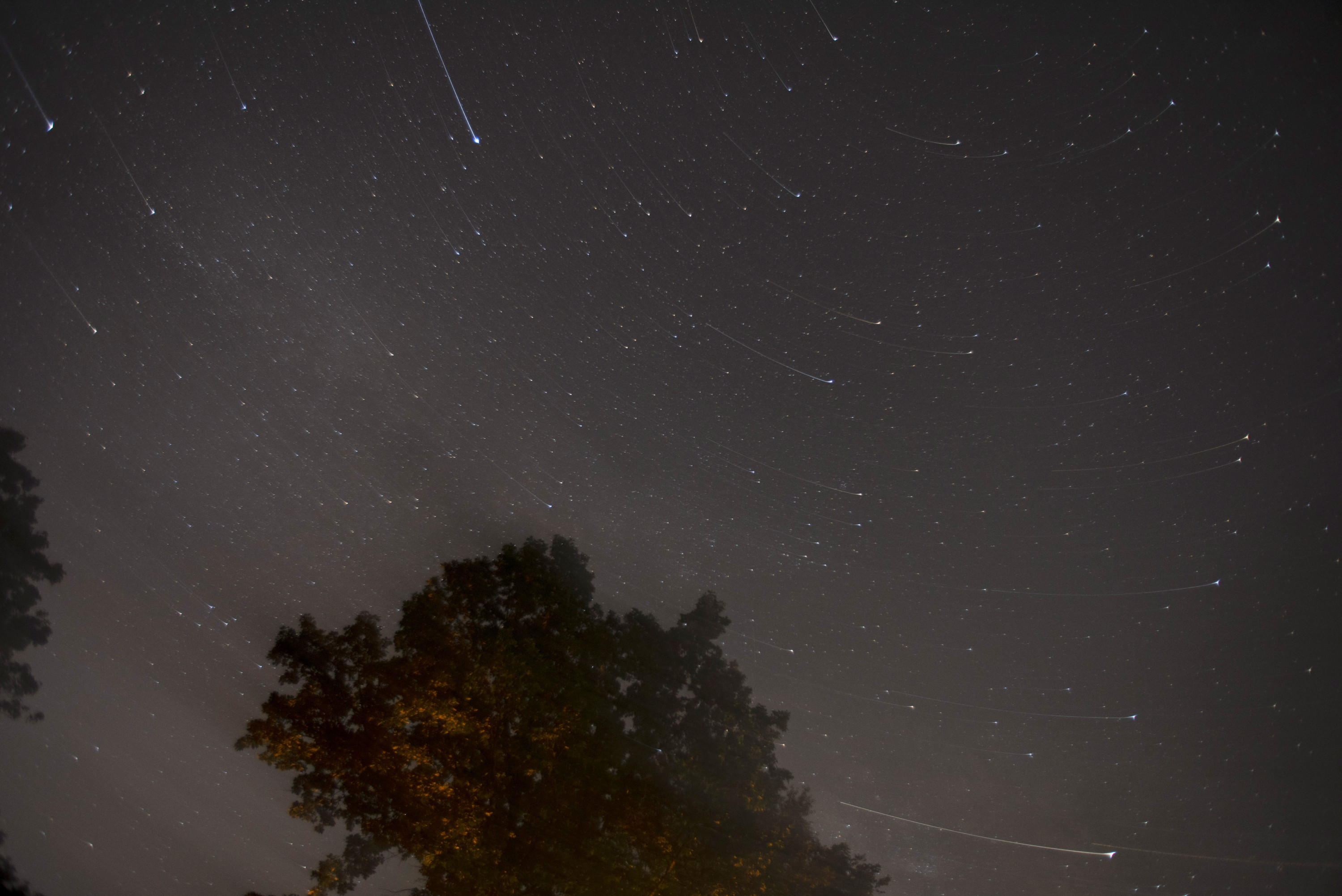 The light from stars is seen streaking across the image as the camera was twirled on its tripod in rural Michigan in June 2017.